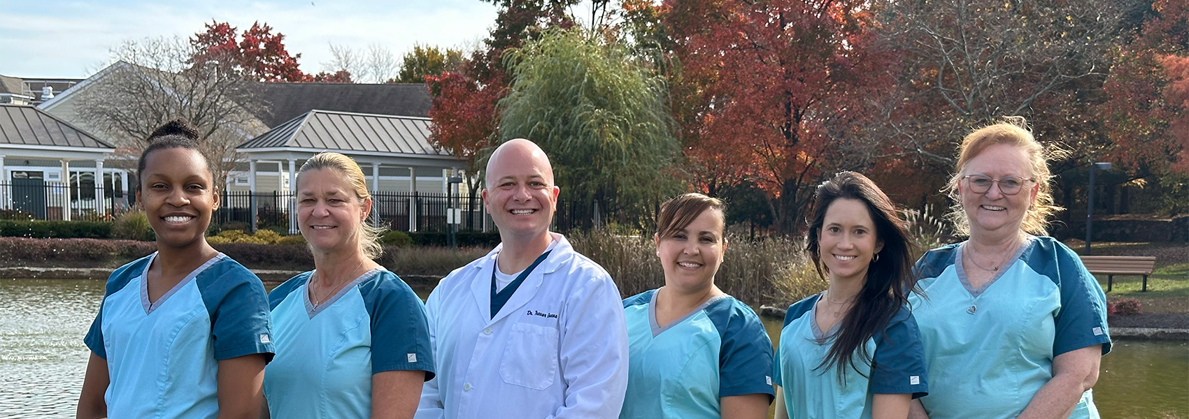 Doctor and the team of Piney Orchard Dental